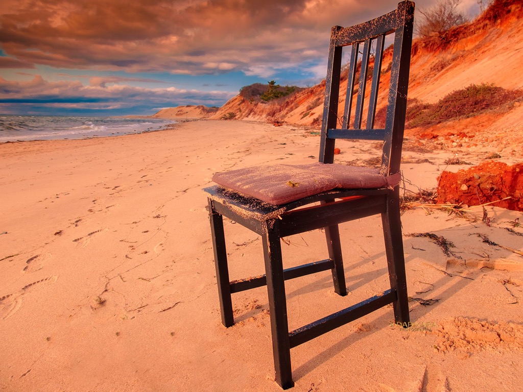 Ladies and gentlemen, please take your seats. Tonight's sunset show by Mother Nature.  Chair on Wellfleet beach, Cape Cod National Seashore.  © Dapixara.