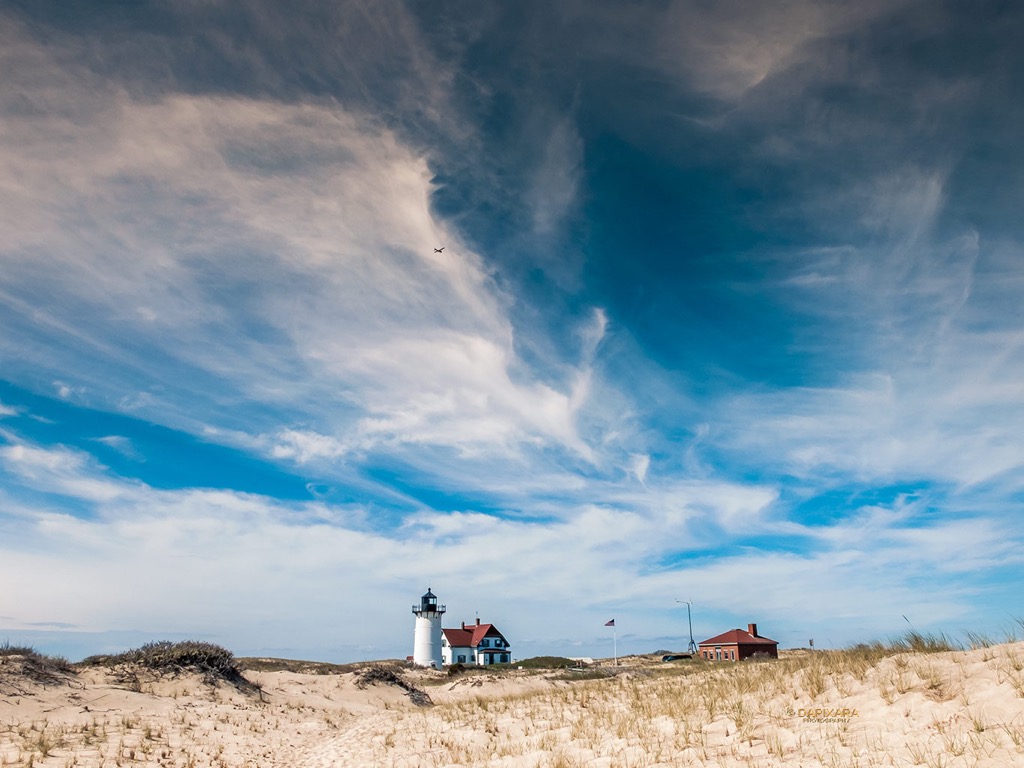 Last of the clouds leaving the Provincetown.  Pretty cool sight at Race Point Lighthouse today! © Dapixara Cape Cod photos.