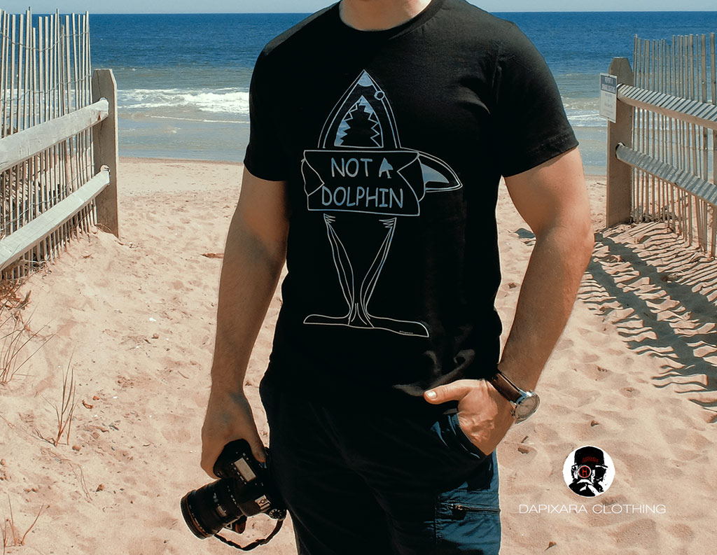 Watch 2019 Cape Cod shark sightings with this must-have Not A Dolphin Shark T-shirt! Perfect gift for shark lovers, and protectors! If you wear fun, bold, black shark t-shirt, you can't  have a bad day!