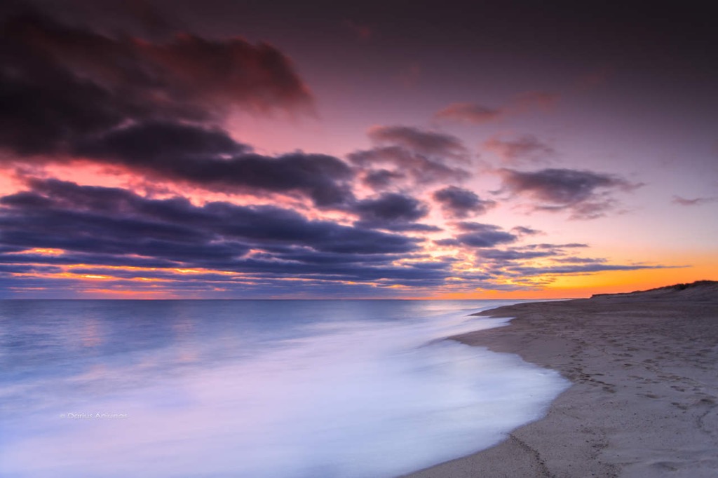Majestic waves on Cape Cod beaches at sunrise.