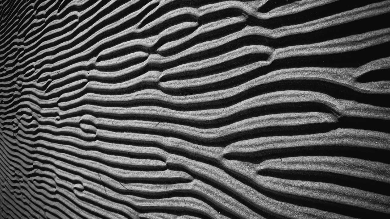 Framed photo print of sand ripples. Black and white photography art.