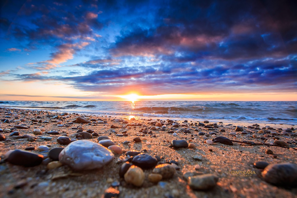 Another Outstanding sunset on Wellfleet beach tonight. Clouds increase after sunset as we prepare for another round of snow (Ocean effect), enjoy! Beach sunset in Wellfleet, Massachusetts. © Dapixara photography.