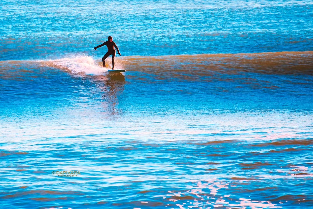 Surfing the waves, Cape Cod National Seashore, Eastham.