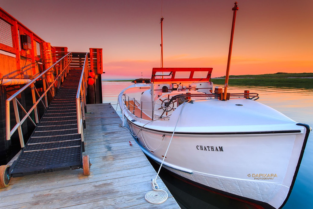 Sunset and Coast Guard boat Chatham CG 36500. © Dapixara.