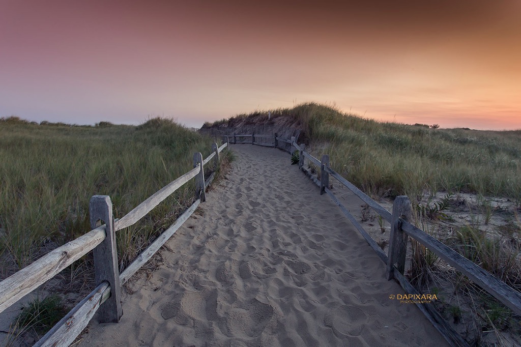 Crosby Landing beach, Brewster. Stunning Crosby Landing beach famous of it’s charming sandy dune pathway with old fashioned fence and aromatic beach roses.