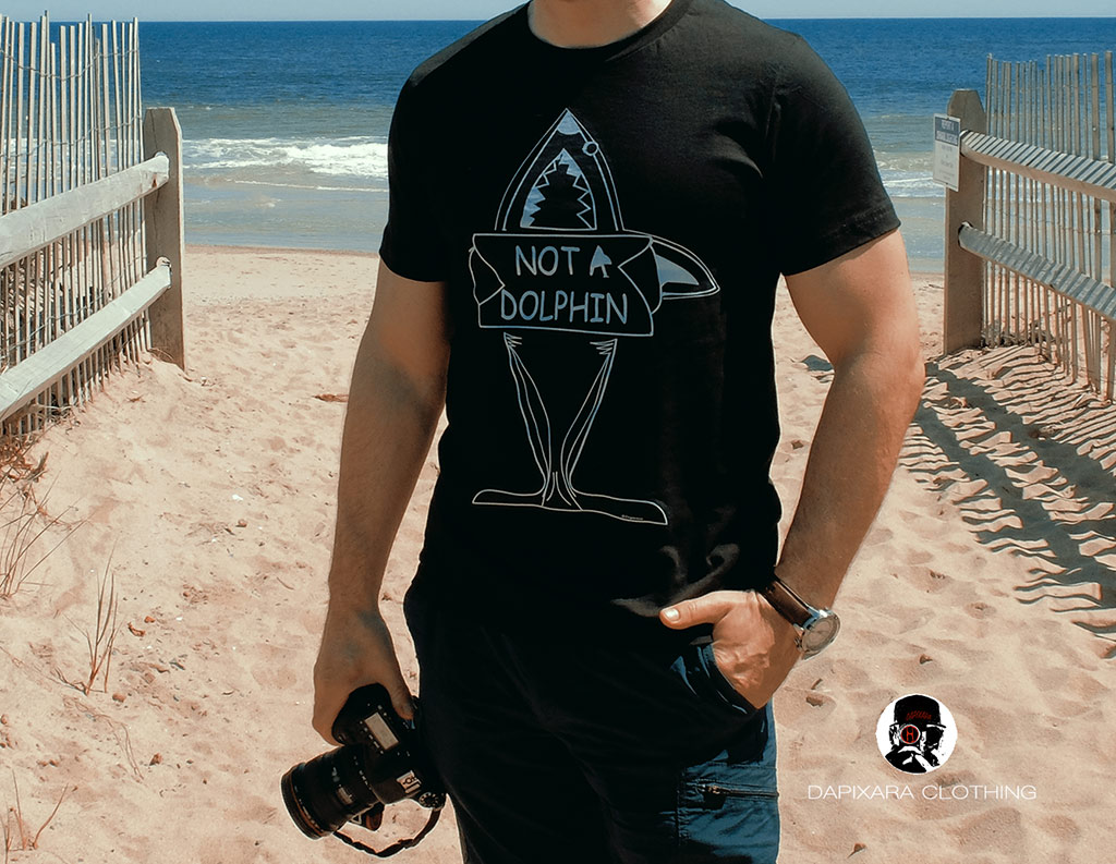 Watch 2019 Cape Cod shark sightings with this must-have Not A Dolphin Shark T-shirt! Perfect gift for shark lovers, and protectors! If you wear fun, bold, black shark t-shirt, you can't have a bad day!