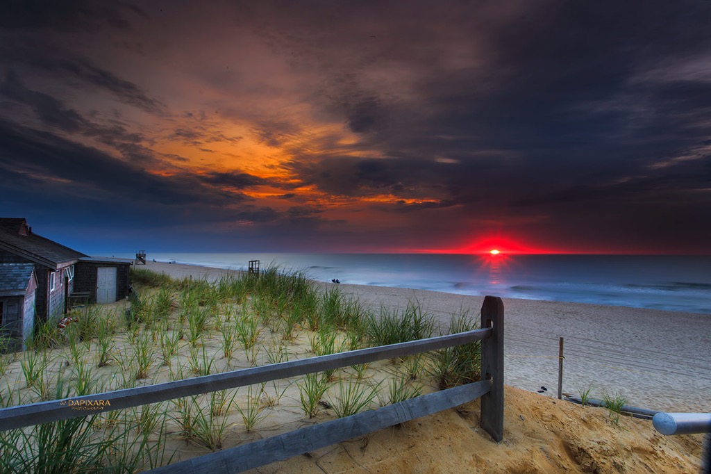 Cape Cod this morning. Startling Ocean sunrise from Nauset beach, Orleans, Massachusetts. Startling Ocean sunrise. Nauset beach, Cape Cod. © Dapixara.