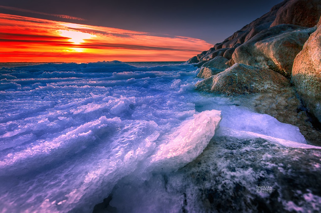 Ice forming on Cape Cod Bay. Today's winter sunset from Cooks Brook beach in Eastham, Massachusetts. Photo by Dapixara https://dapixara.com